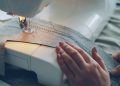 Someone is sewing with a sewing machine.