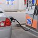 a car is parked at a gas pump