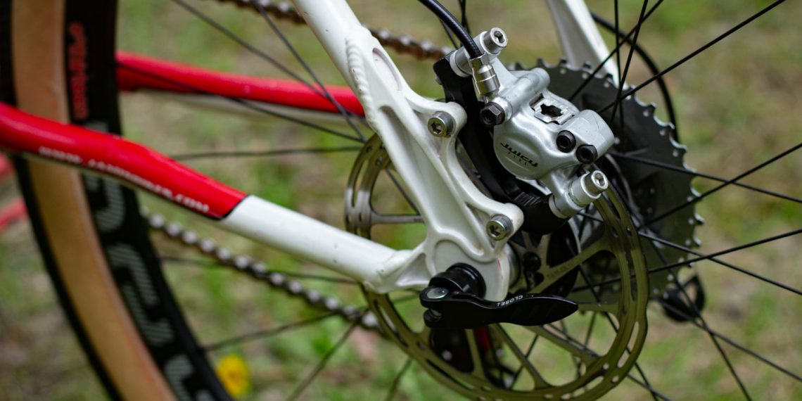 Rear bicycle wheel with disc brake detail.